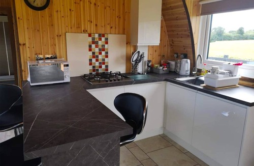 Trowse Newton Cabin | Pod 1 with Countryside view and Hot Tub