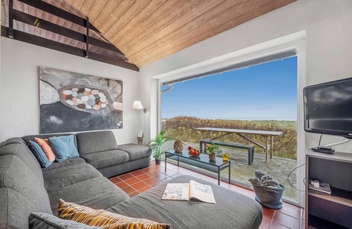 Lild Strand House | Pool and activity house with a 180-degree view of the North Sea, located at.