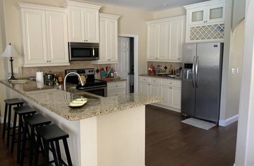 Golf and Sea Village of Apollo Beach House | Pool and heated spa, 3 bedroom, 2 baths, golf, beaches, safe community.