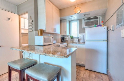 Treasure Island Condo | 🌴 Pool-facing Studio @ Tropic Terrace | Heated Pool Direct Beach Access ➠ TT55