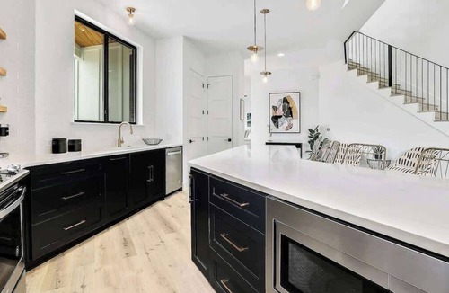 Elmhurst Heights House | Pool + Mural Patio | South Austin Retreat