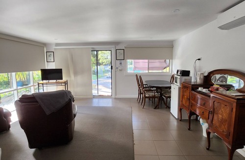 Kyneton Cottage | Pool room - tranquil spacious room with pool views.