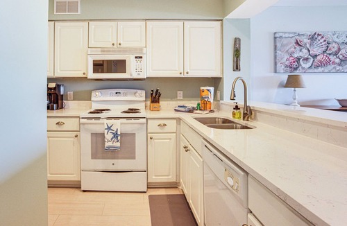 Beachwalk Condo | Poolside Fun & Ocean Strolls: Harbor Island Haven!