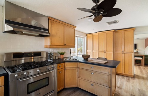 Disston Heights House | Poolside Palm Hideaway - Saltwater Pool, Hot tub, Games & FUN!