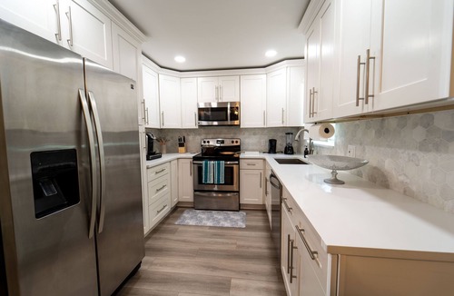 Lake Worth Corridor House | Poolside Paradise Luxury home Mins from the beach