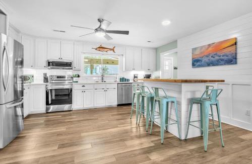 Tranquil Harbour House | Poolside Paradise by Oak Island Accommodations