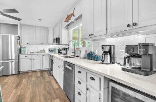 Tranquil Harbour House | Poolside Paradise by Oak Island Accommodations