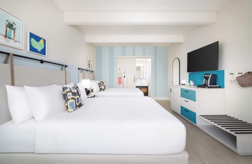 New Town Hotel | Poolside Paradise l Fire Pits, Lawn Games, Live Music & Endless Fun