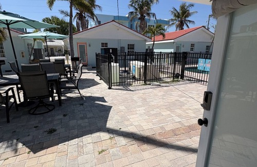 Sunset Beach House | Poolside renovated studio w/full kitchen #1