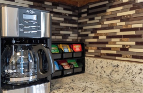 South Side Condo | Poolside this Summer at Cozy Gardens Retreat