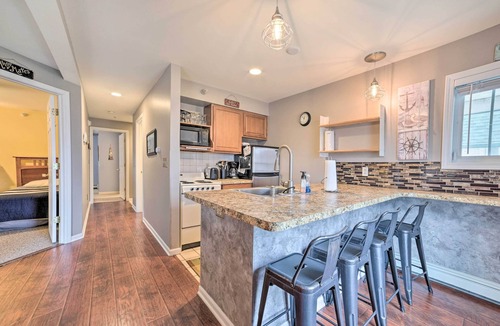 Onekama Condo | Portage Lake Condo w/Deck & Pool Access!