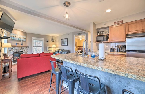 Onekama Condo | Portage Lake Condo w/Deck & Pool Access!