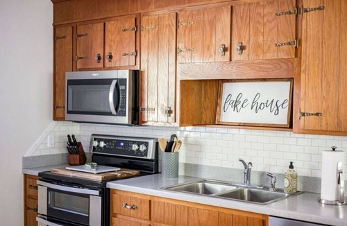 North Shore House | Private Cove + Dock, Kayaks, Paddleboards, Fire Pit, Pet-Friendly Lake Escape