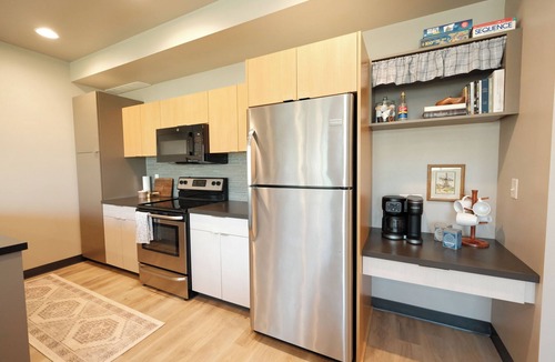 Sioux Center House | Prairie Huis Townhome steps away from Dordt University in a quiet neighborhood.