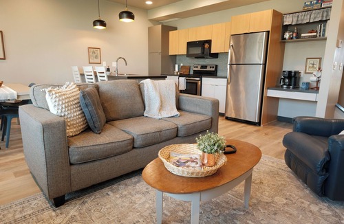 Sioux Center House | Prairie Huis Townhome steps away from Dordt University in a quiet neighborhood.