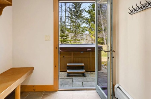 Stratton Mountain Villa | Premier Treetop Townhome with Fireplace, Shuttle and Private Hot Tub