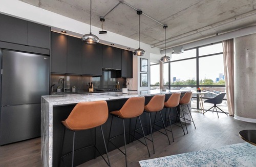 Leslieville Condo | Premium Film District Unit: Skyline + Sunset Views