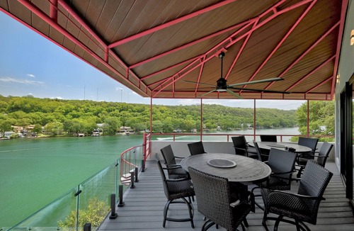 Oak Shores On Lake Austin House | Premium Lake Austin Lakeside Bedrooms. 6 Hole Mini Golf Course and Waterfall