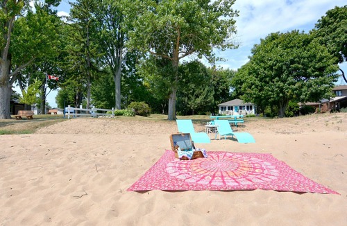 Ruthven Cottage | Prepare to fall in love with this adorably tropical beach front property!
