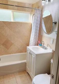 Hacienda Heights House | Pretty bedroom with shared bathroom