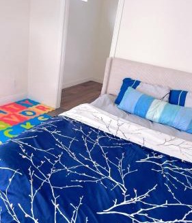Hacienda Heights House | Pretty bedroom with shared bathroom