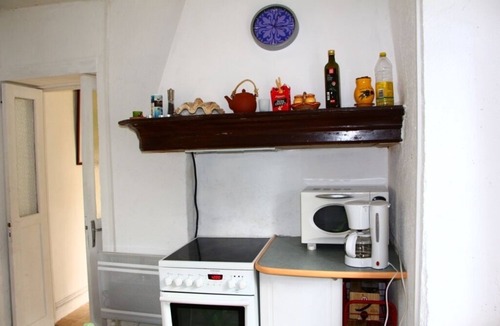 Ore House | Pretty pink house with blue shutters