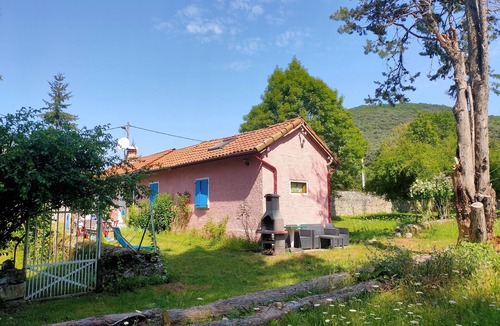Ore House | Pretty pink house with blue shutters