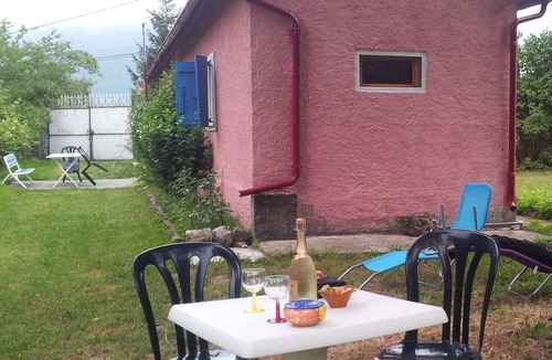 Ore House | Pretty pink house with blue shutters