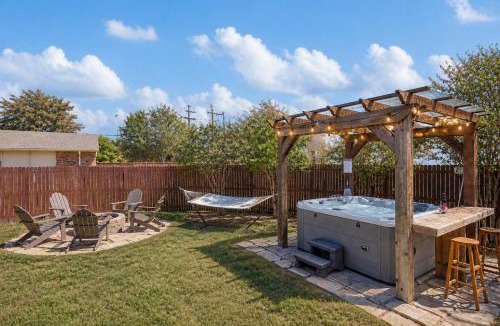 Plano House | Prime Location- 4BR Hot Tub, BBQ & Kids Play Zone