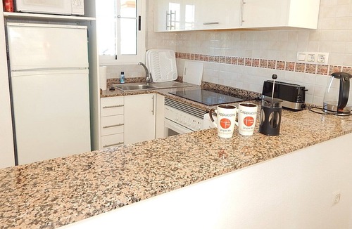 Orihuela Costa Apartment | Prime location for Villamartin Plaza, overlooking communal pool