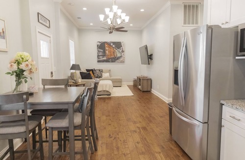 McFerrin Park House | Prime Location, Sleeps 10, 7 Beds, Cozy Front Porch and patio with Hot Tub