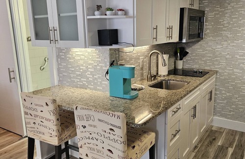 Southwest Orlando Condo | Prime Resort Studio near Universal & Disney balcony with LAKE VIEW