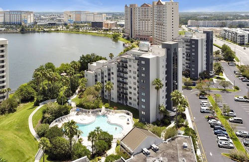 Southwest Orlando Condo | Prime Resort Studio near Universal & Disney balcony with LAKE VIEW