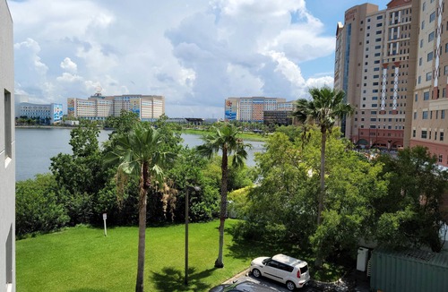 Southwest Orlando Condo | Prime Resort Studio near Universal & Disney balcony with LAKE VIEW