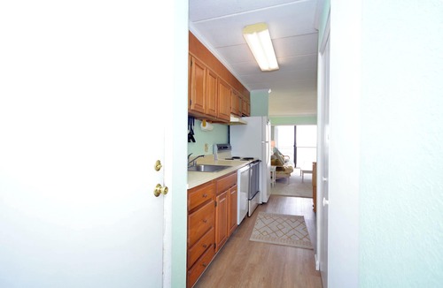 Midtown Ocean City Condo | Pristine, bright 1 bedroom oceanfront condo with free WiFi, coastal decor, and a gorgeous view of the ocean located in quiet midtown and only a few steps from the beach!