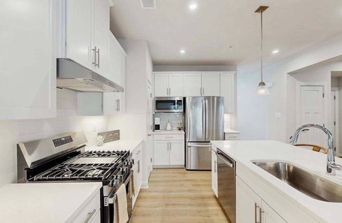 Bayside House | Pristine single family home w/pool & clubhouse access, patio, central AC & WiFi