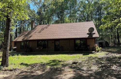 Avinger Cabin | Priv 80 secluded spa cabin retreat in woods nature ATV trails fish hunt relax