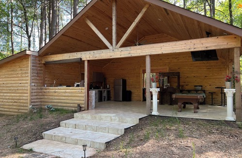 Avinger Cabin | Priv 80 secluded spa cabin retreat in woods nature ATV trails fish hunt relax