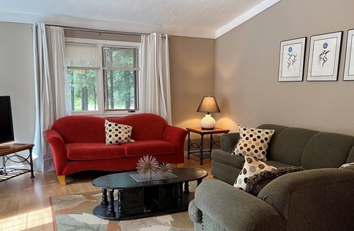 Candle Lake House | Privacy Galore! Enjoy this roomy year round lake home surrounded by the forest