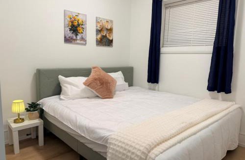 Oakridge Apartment | Private 2-Bedroom Basement Suite with Patio, Free Parking & Laundry
