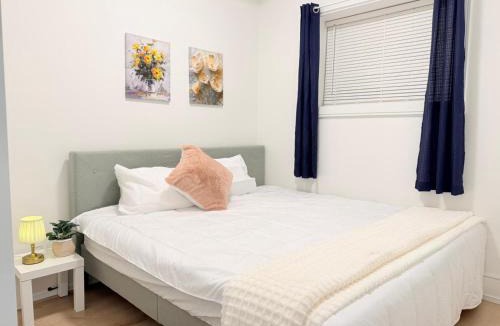 Oakridge Apartment | Private 2-Bedroom Basement Suite with Patio, Free Parking & Laundry