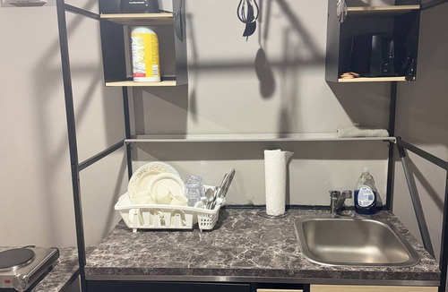 Brandon Condo | Private Basement Suite in Brandon – Kitchenette, Dining & Comfort