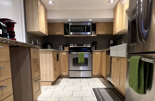 Olympus Cove House | Private Basement Apartment in Olympus Cove with EV Charger