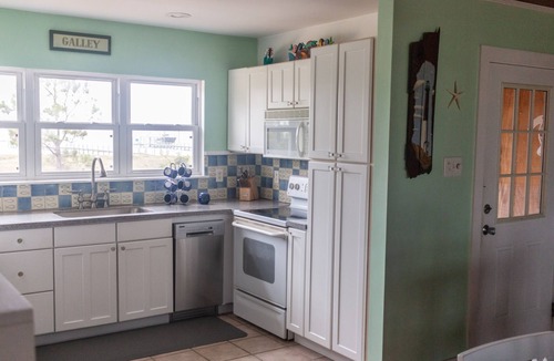 Alligator Point House | Private beach and Bay with a Dock. Ground Level home, Ocean front property