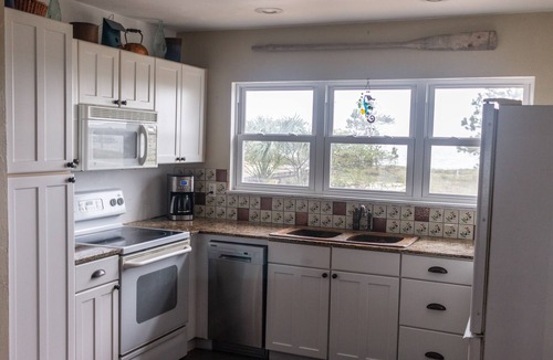 Alligator Point House | Private beach and Bay with a Dock. Ground Level home, Ocean front property