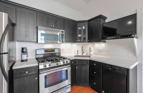 Elkhart Lake Condo | Private Beach, Pools & Full-Kitchen