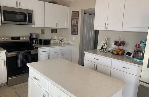 Spring Hill House | Private bedroom with complementary coffee in fabulous Spring Hill