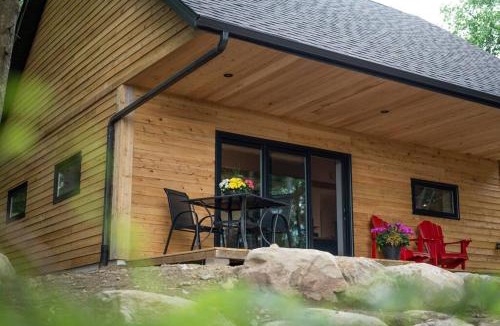 Madawaska Valley Ski Chalet | Private Cliffside Chalet Nestled in Nature With Western Sunsets & Waterfront Access Near Algonquin Park