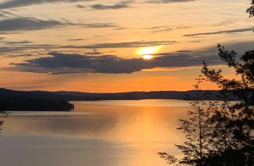 Madawaska Valley Ski Chalet | Private Cliffside Chalet Nestled in Nature With Western Sunsets & Waterfront Access Near Algonquin Park