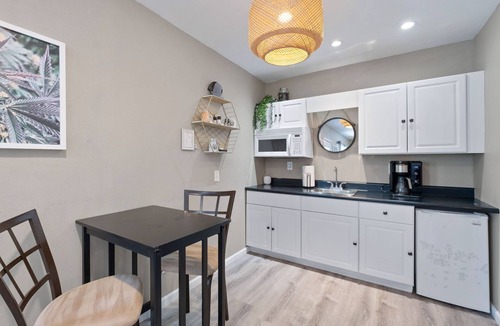 Grafton Cottage | Private deck with hot tub and fire pit.